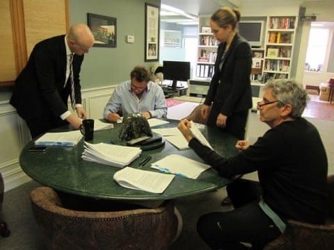 Signing the sale of Aver Media to BMO