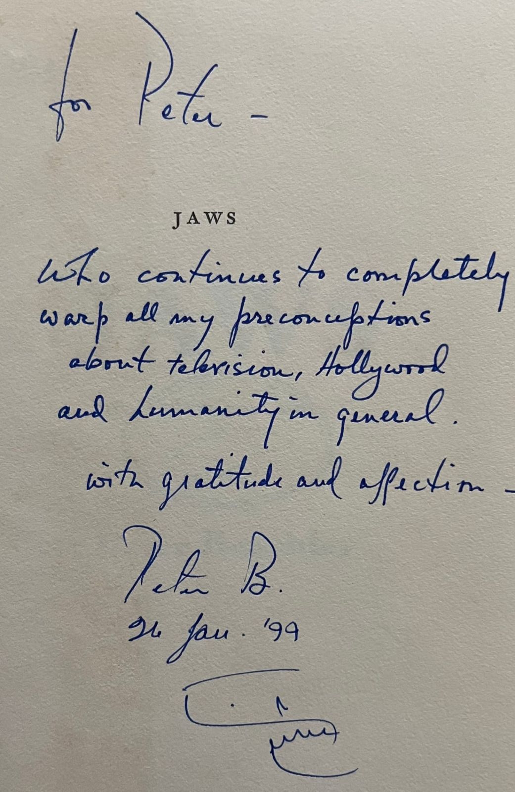 Handwritten inscription from Peter Benchley to Peter A. Sussman on the title page of Jaws