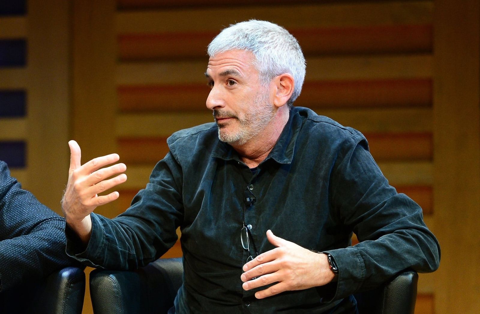 Peter A. Sussman speaking on stage