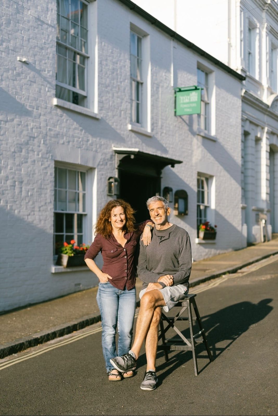 Sara Curran and Peter A. Sussman outside Foresters Hall