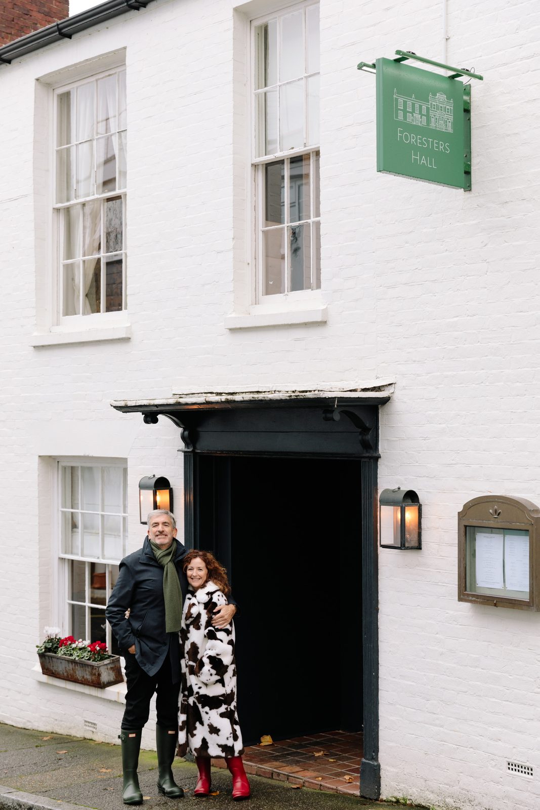 Peter A. Sussman and Sara Curran outside Foresters Hall