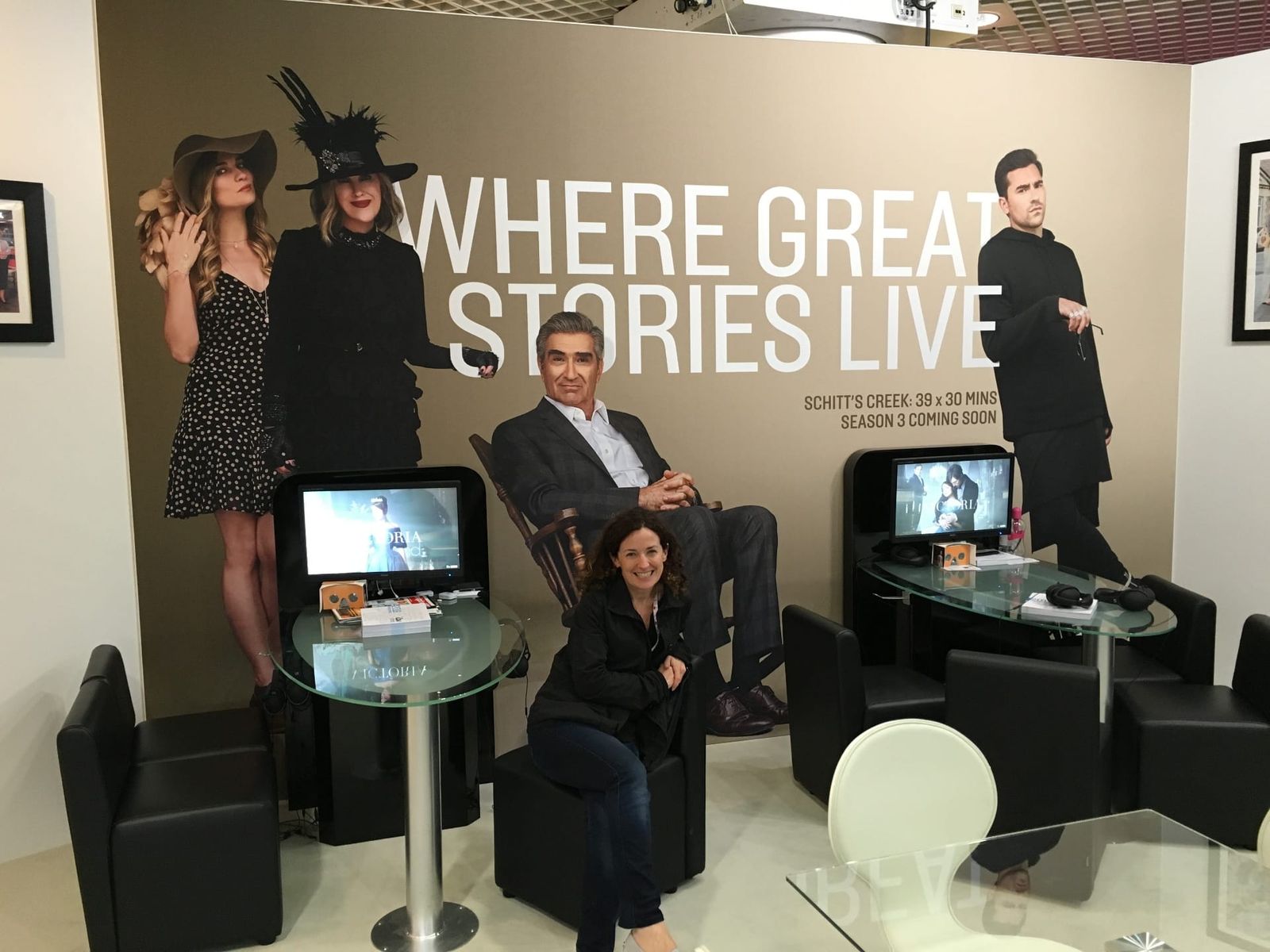 Sara Curran in front of the Schitt&rsquo;s Creek display on the ITV stand at MIPCOM